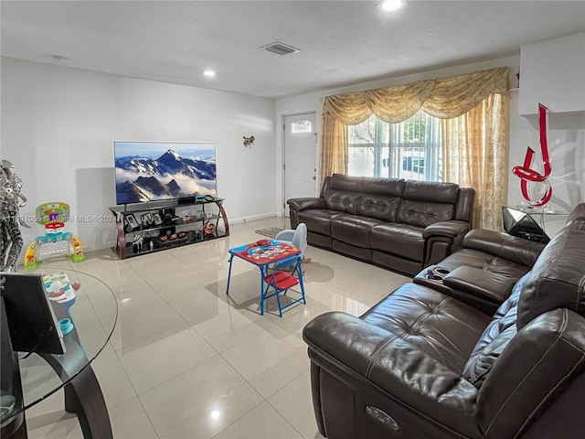 living room with light tile patterned floors