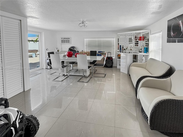 interior space featuring a textured ceiling