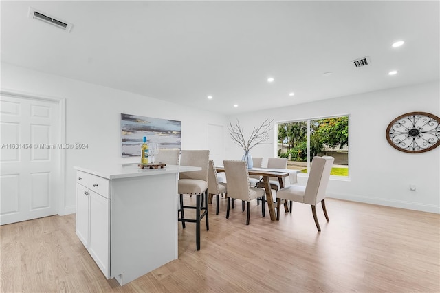 dining room featuring light wood-type flooring