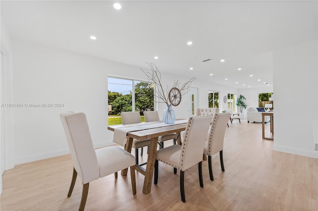 dining room with light hardwood / wood-style flooring