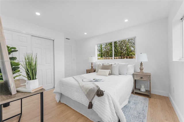 bedroom featuring light wood-type flooring