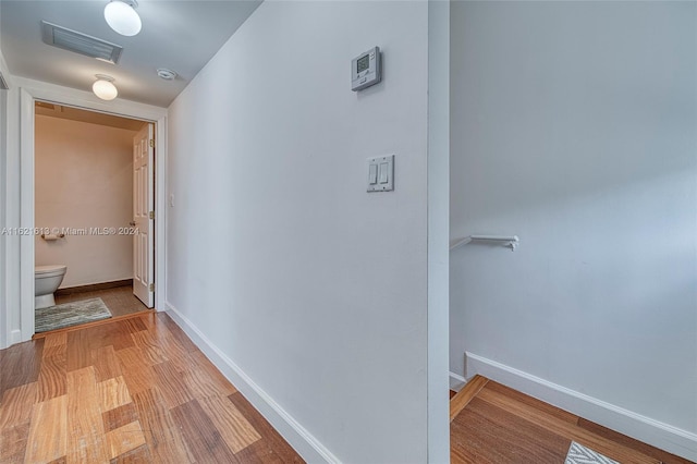 corridor featuring light wood-type flooring