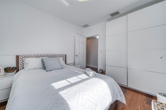 bedroom featuring hardwood / wood-style floors