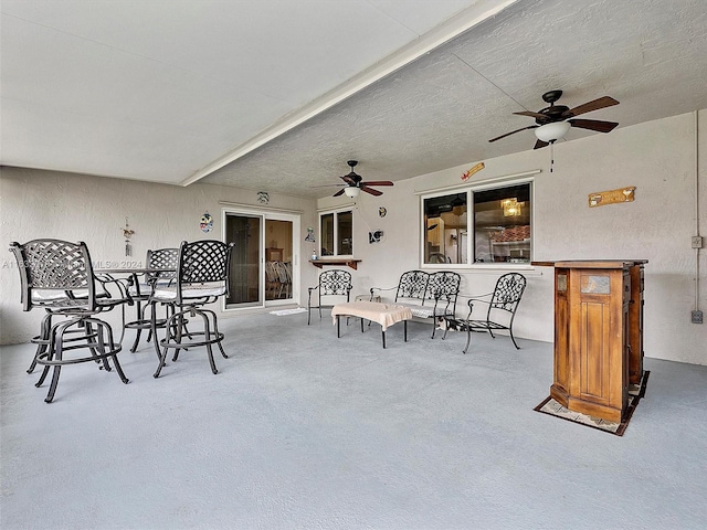 view of patio / terrace featuring ceiling fan