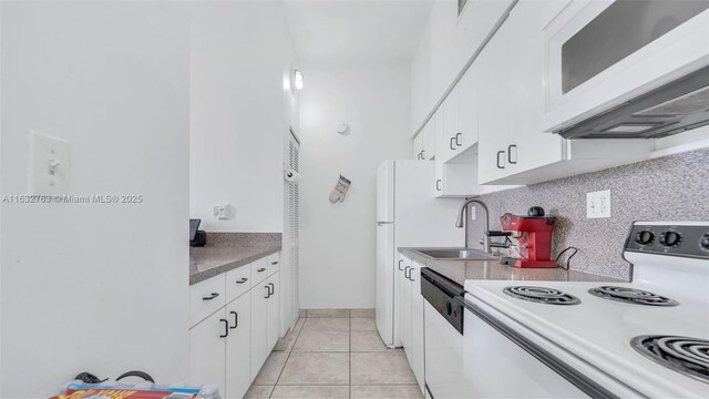 full bathroom featuring vanity, shower / bath combo, toilet, and tile patterned floors