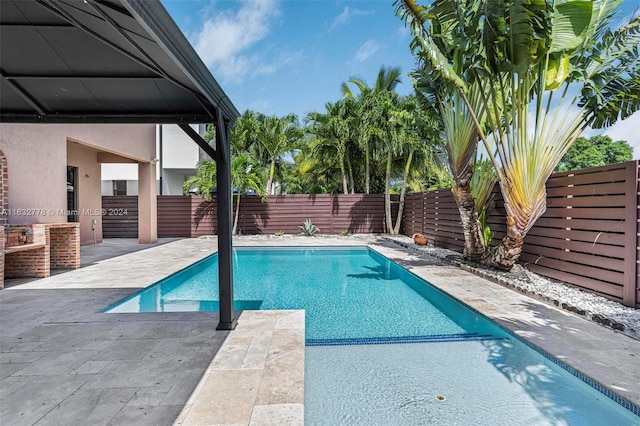 view of pool featuring a patio