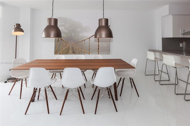 view of tiled dining space