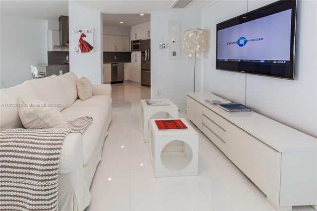 living room featuring light tile patterned floors