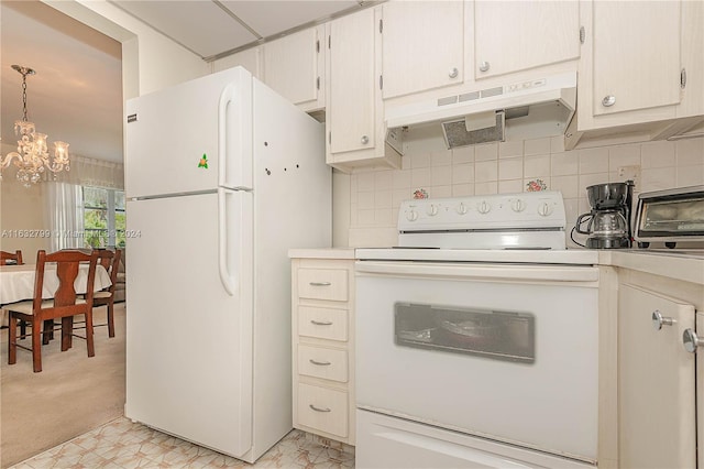 kitchen featuring a chandelier, light tile patterned floors, decorative backsplash, and white appliances