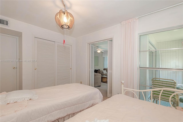 carpeted bedroom featuring a closet