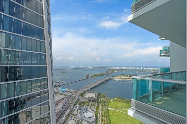 balcony featuring a water view