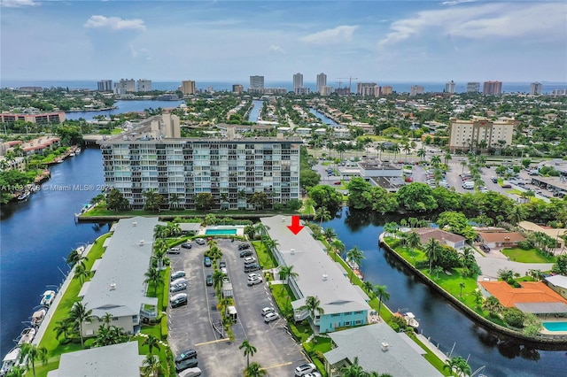 birds eye view of property featuring a water view