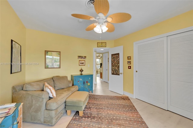 living room featuring ceiling fan