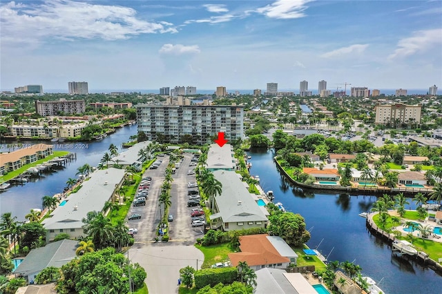 birds eye view of property featuring a water view