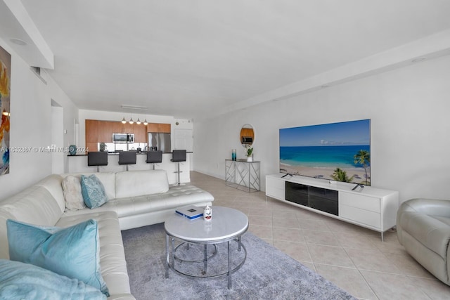 living room with light tile patterned flooring