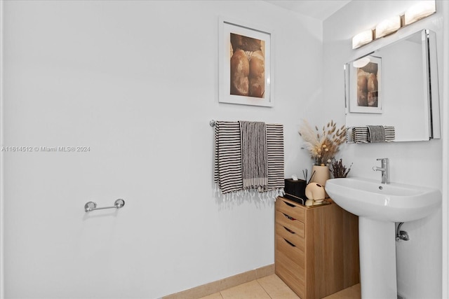 bathroom featuring tile patterned floors and sink