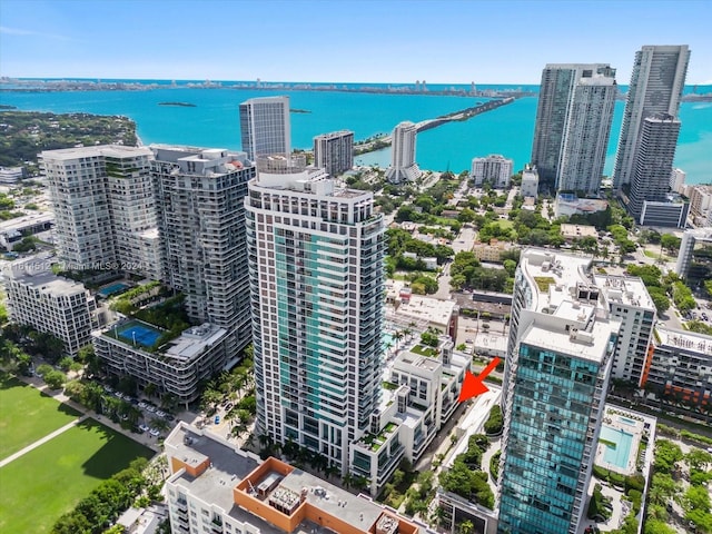 drone / aerial view with a water view