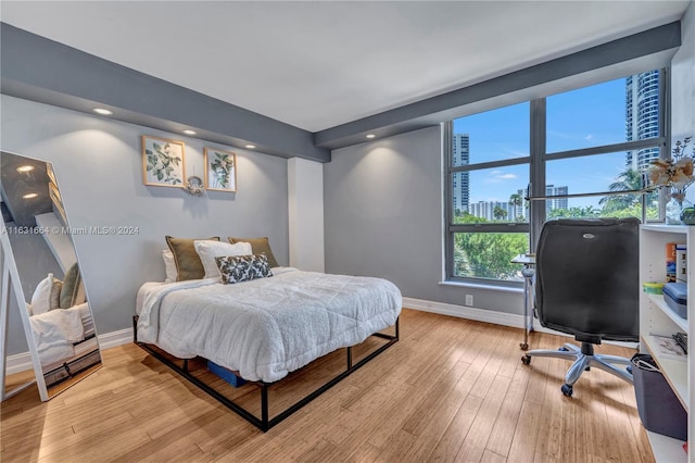 bedroom featuring light wood-type flooring