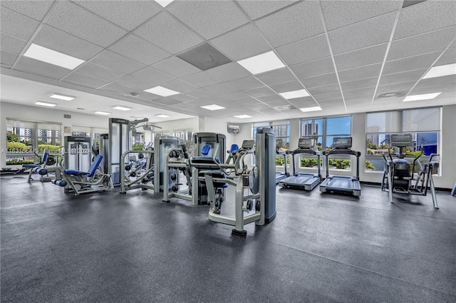 gym featuring a paneled ceiling