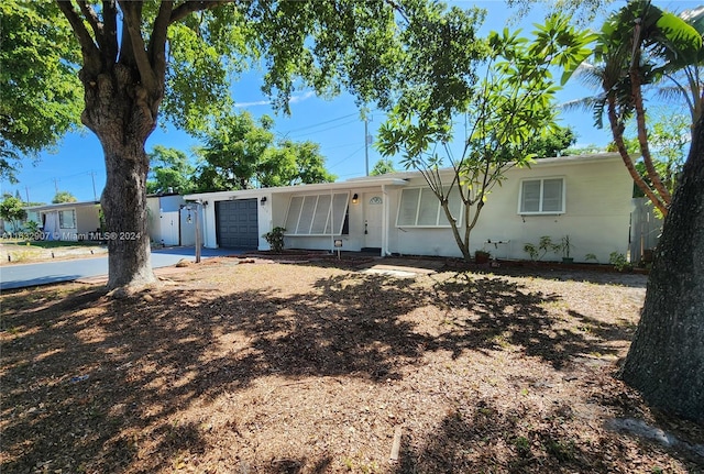 ranch-style house with a garage