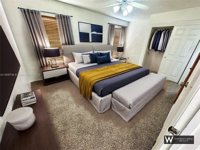 bedroom featuring carpet, a closet, and ceiling fan