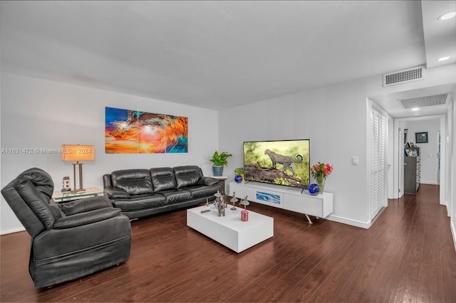 living room featuring dark hardwood / wood-style floors