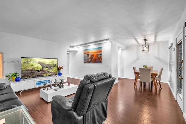 living room featuring dark hardwood / wood-style floors