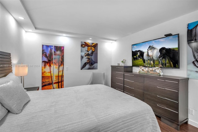 bedroom with wood-type flooring