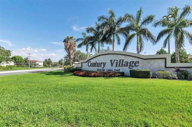 community sign with a lawn