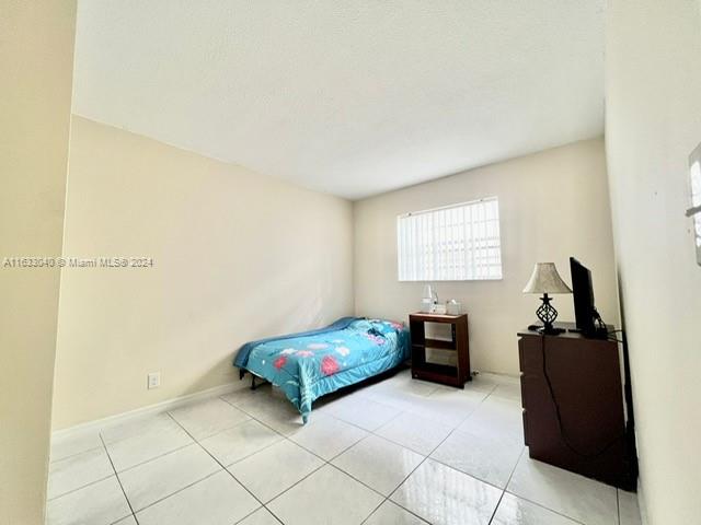 view of tiled bedroom