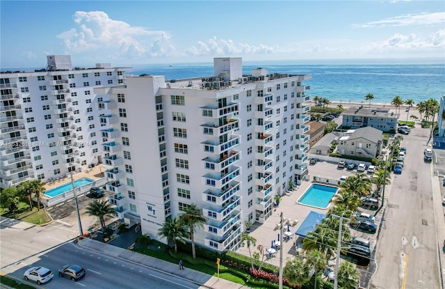 birds eye view of property featuring a water view