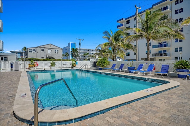 view of pool featuring a patio area