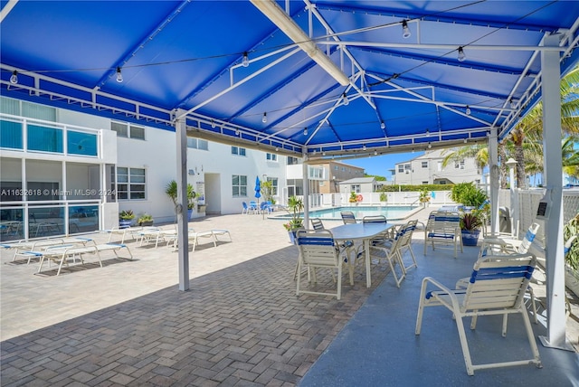 view of patio / terrace featuring a community pool