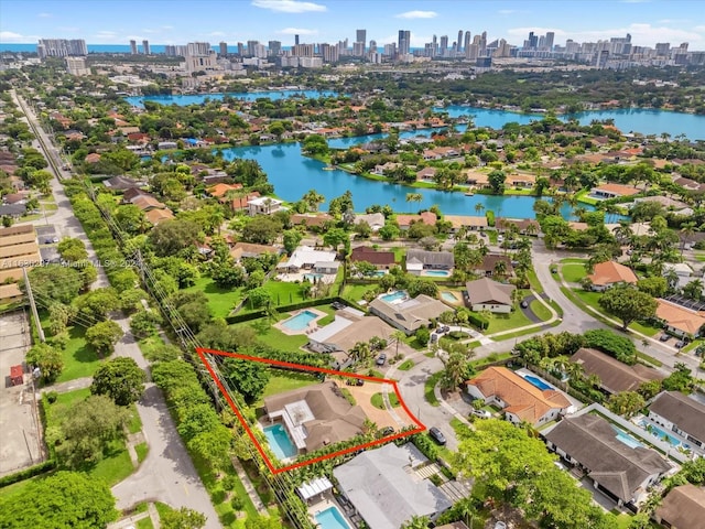 drone / aerial view with a water view