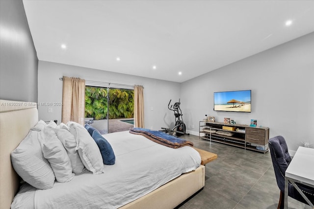 bedroom with vaulted ceiling and access to outside