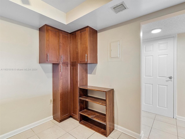 interior space featuring light tile patterned floors