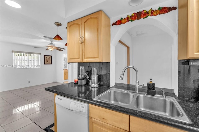 kitchen with ceiling fan, dishwasher, decorative backsplash, and light brown cabinets