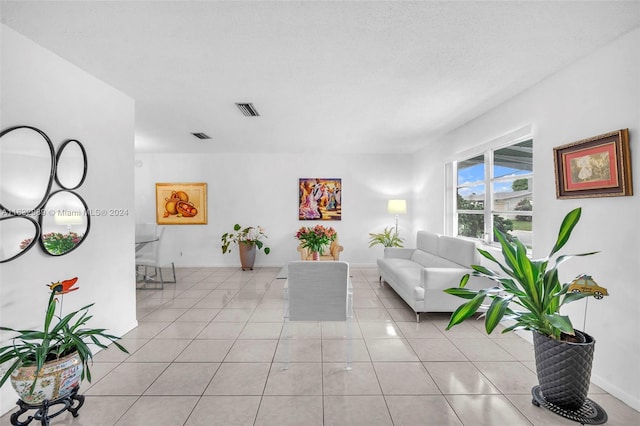 living room featuring light tile patterned floors