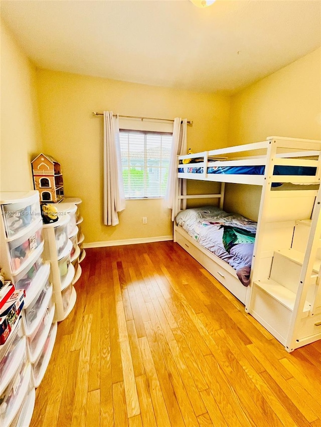 unfurnished bedroom with wood-type flooring