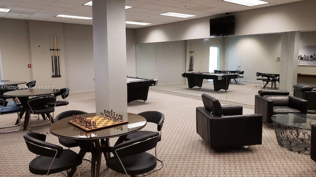 recreation room featuring pool table, a drop ceiling, and light carpet