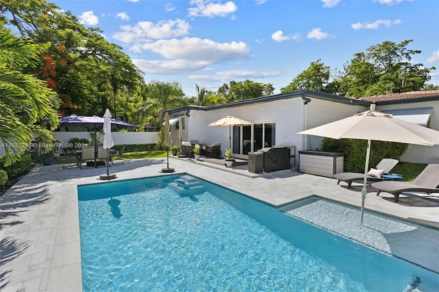 view of pool featuring a patio