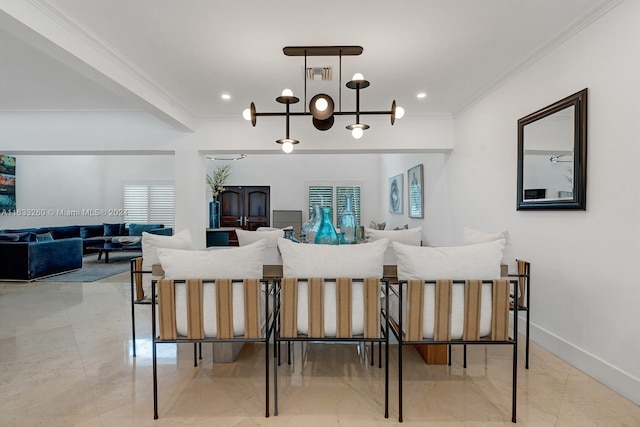 dining space featuring crown molding and an inviting chandelier