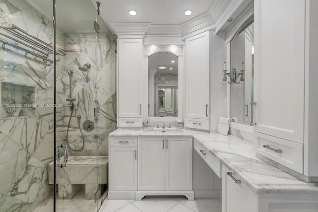 bathroom featuring ornamental molding, vanity, and walk in shower