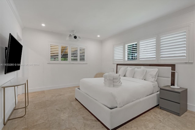 bedroom featuring ornamental molding