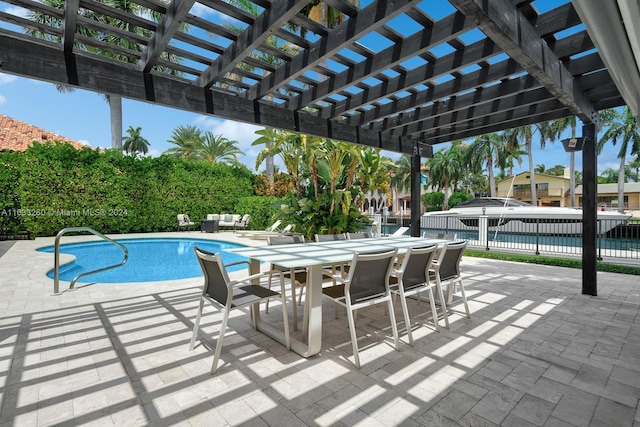 view of swimming pool with an outdoor hangout area, a pergola, and a patio area