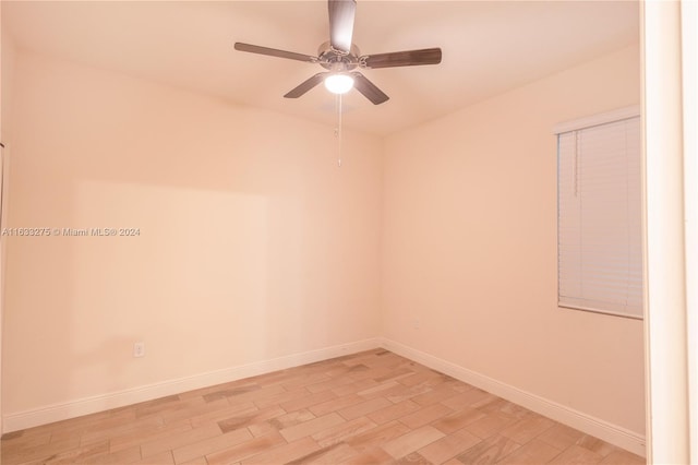 unfurnished room with ceiling fan and light wood-type flooring