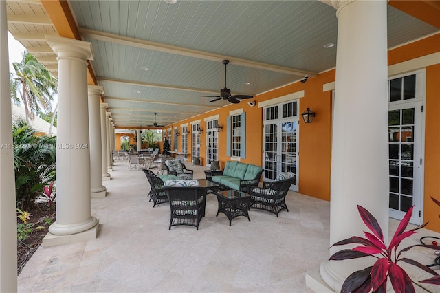 view of patio featuring an outdoor living space, french doors, and ceiling fan