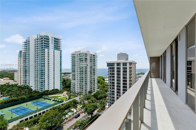 balcony featuring a water view