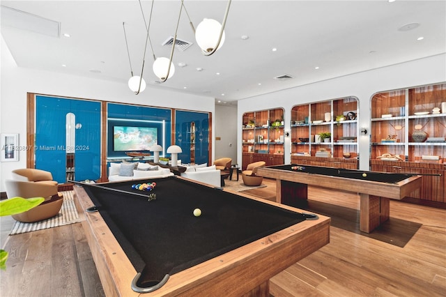 game room featuring light hardwood / wood-style floors and billiards