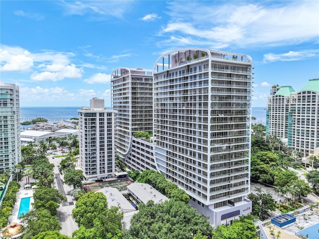 view of building exterior with a water view